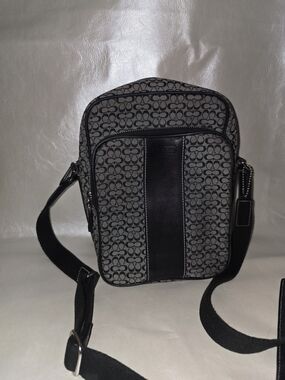 Coach Signature Jacquard flight bag.